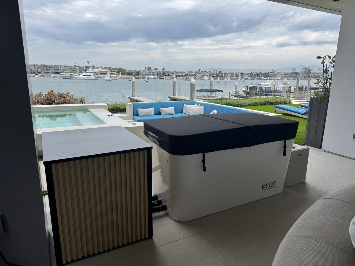 RevX Acrylic X Tub cold plunge overlooking a waterfront